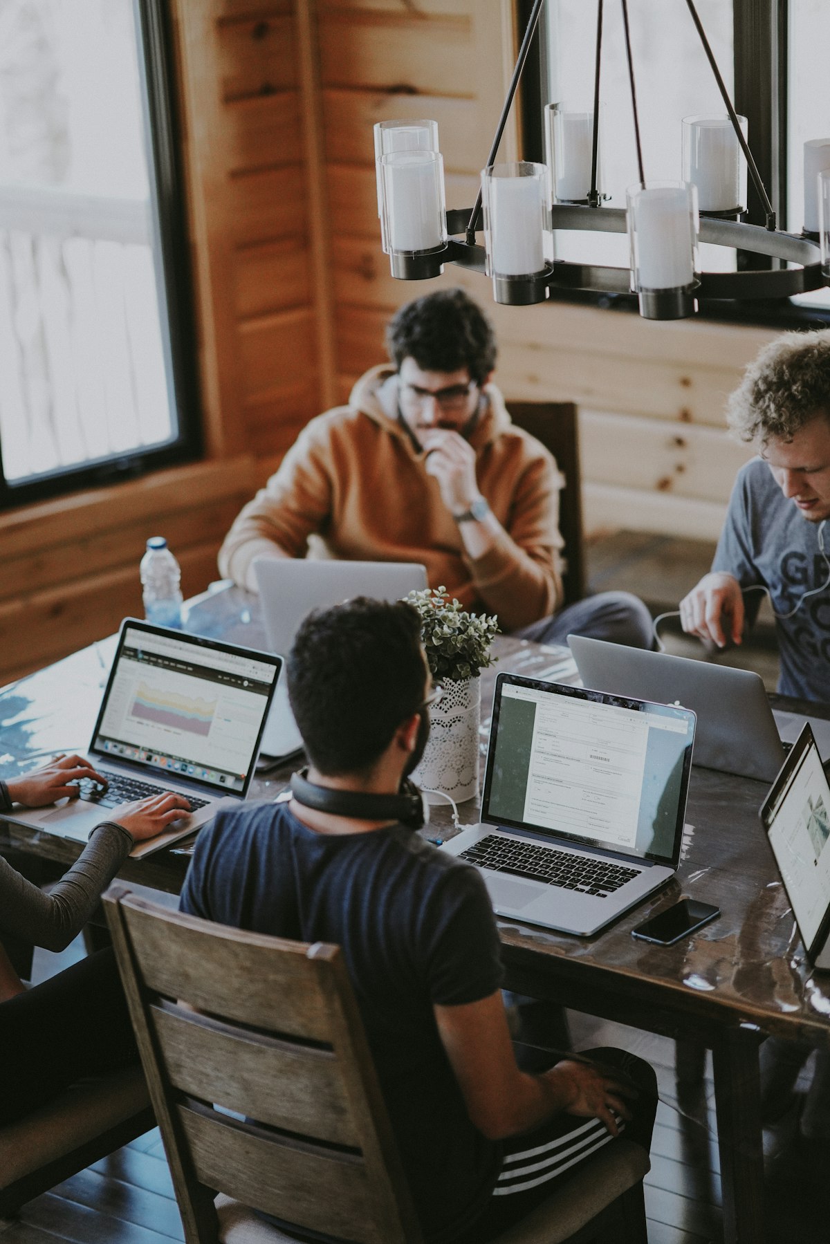 A focused group working together in a warm interior